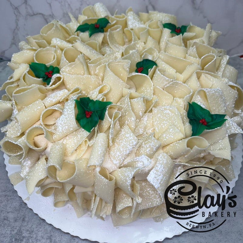 White Chocolate Shavings Covered Cake with Holly