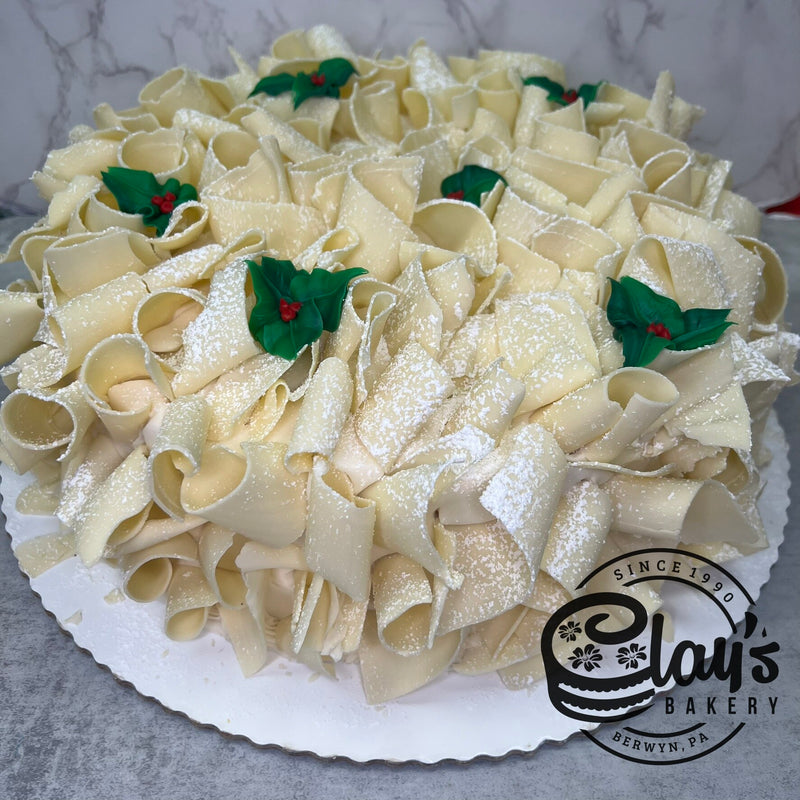 White Chocolate Shavings Covered Cake with Holly