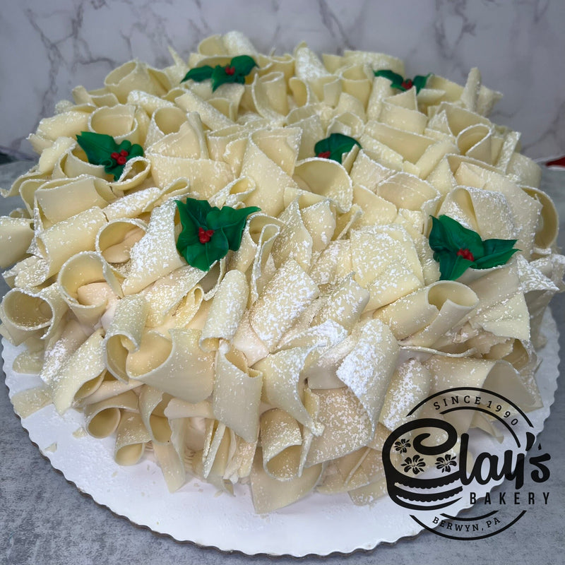 White Chocolate Shavings Covered Cake with Holly
