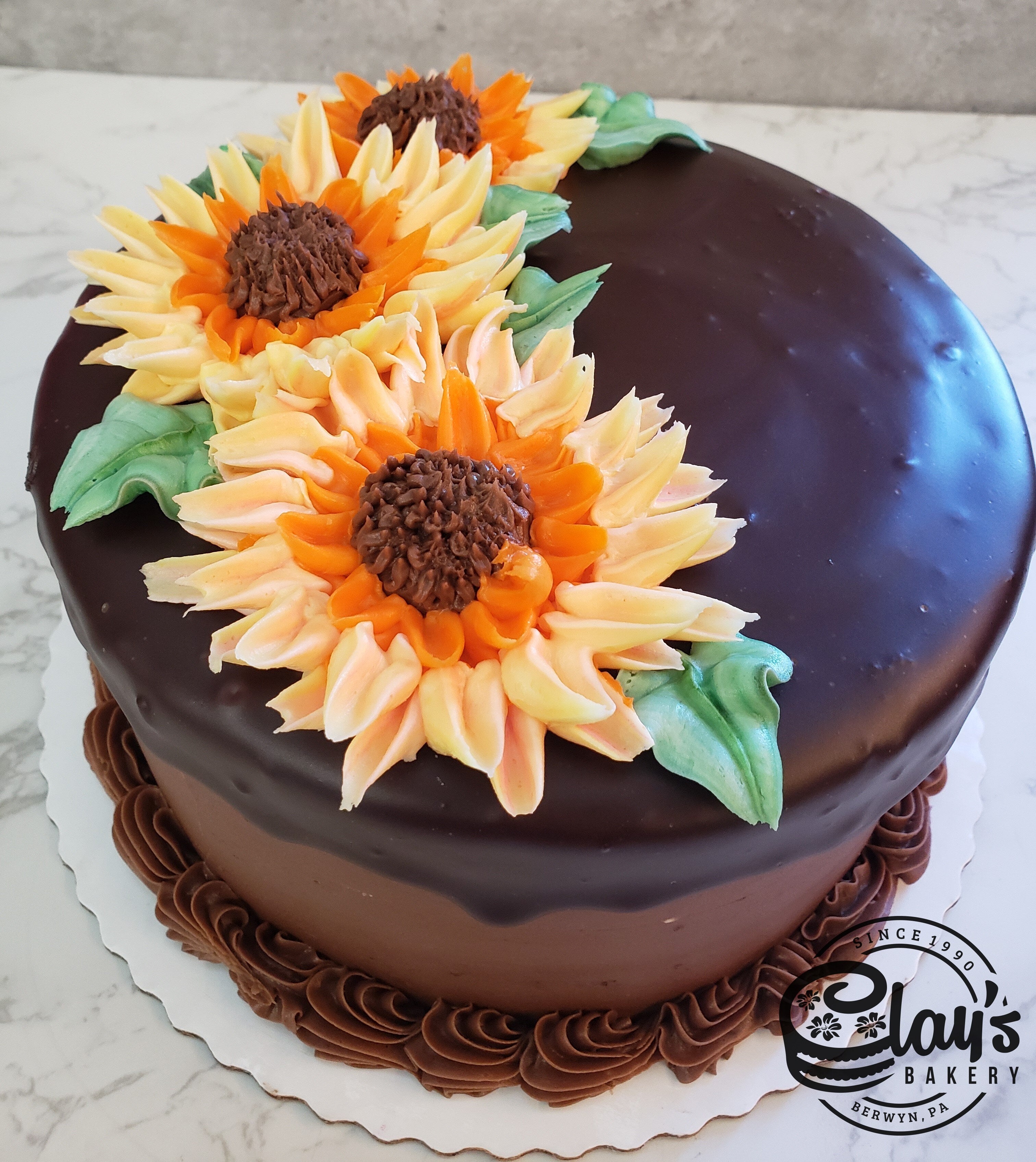 Sunflowery with Chocolate Drip – Clay's Bakery